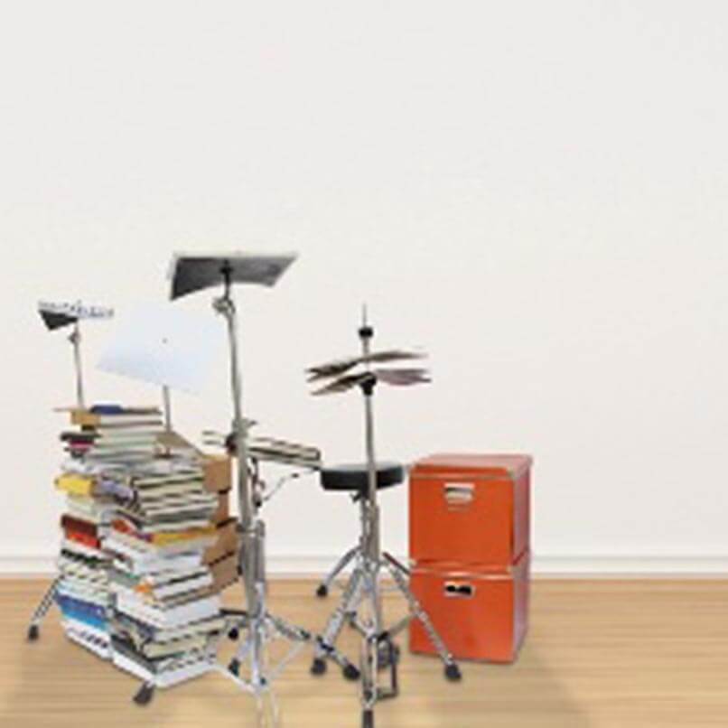 Imagen de un batería hecha con libros.